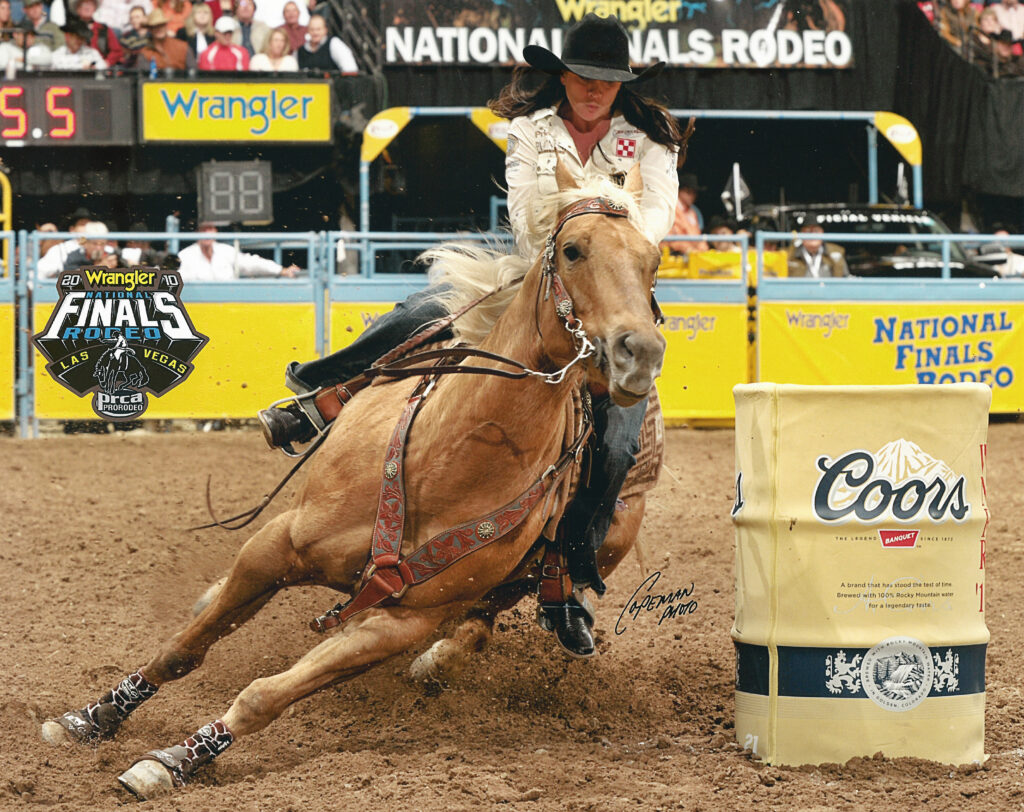 French Covergirl, a yellow horse turns a barrel