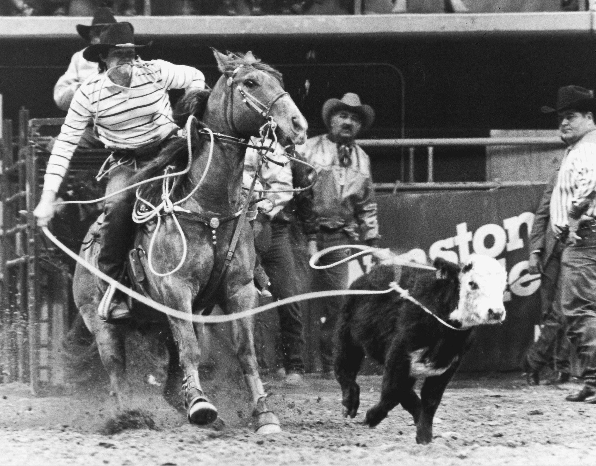 Joe Beaver tying down a calf at his first NFR in 1985