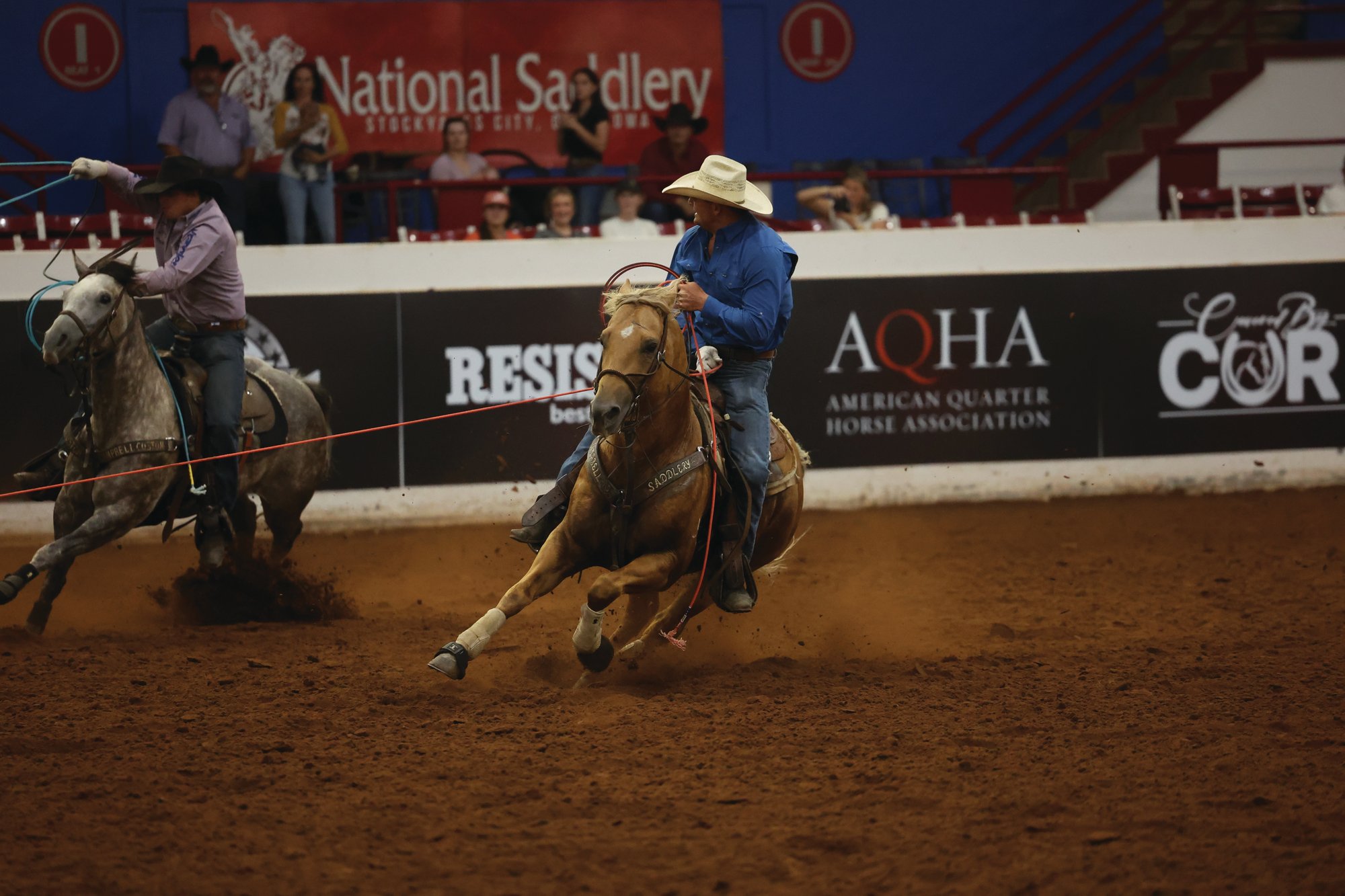 Logan Allen roping on I Got Dibs Doc at the AQHA World Show