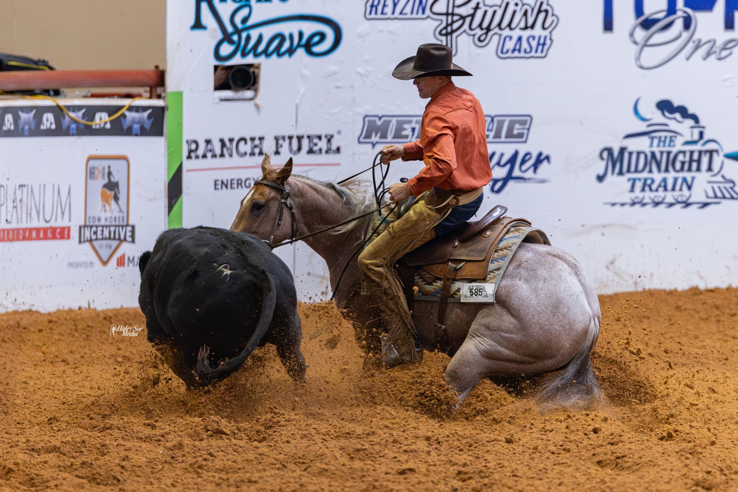 Isaac Johnson works a cow at the NRCHA Snaffle Bit Futurity